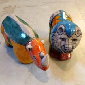 Raku South Africa hand made pottery, lion and rhino.
